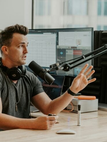 Contractor handling business calls while podcasting