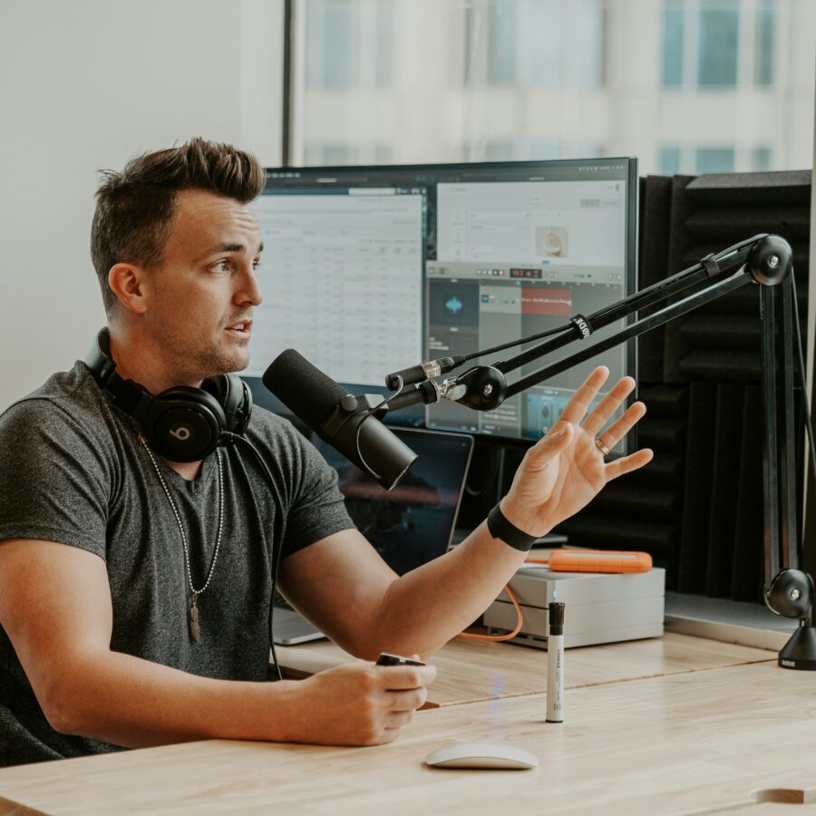 Contractor handling business calls while podcasting